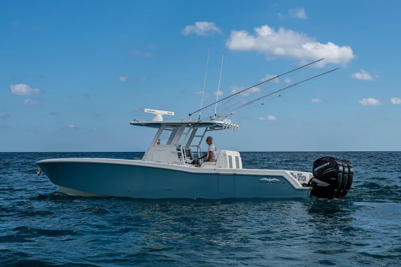 Slide: The Image of 2023 Invincible 36 Open Fisherman boat on open sea with clear blue sky. - 97