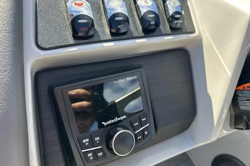 Slide: The Image of Control panel of a 2021 Bennington 24 RTFB boat with Rockford Fosgate audio system. - 18