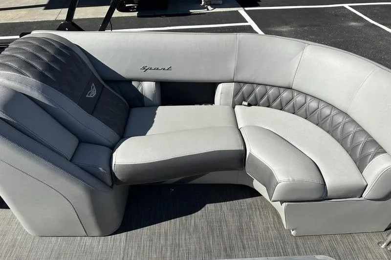 Slide: The Image of 2021 Bennington 24 RTFB boat seating with gray upholstery and quilted design. - 23