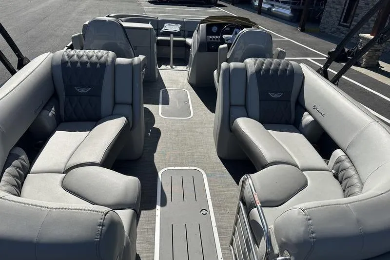 Slide: The Image of 2021 Bennington 24 RTFB pontoon boat interior with luxurious gray seating. - 26