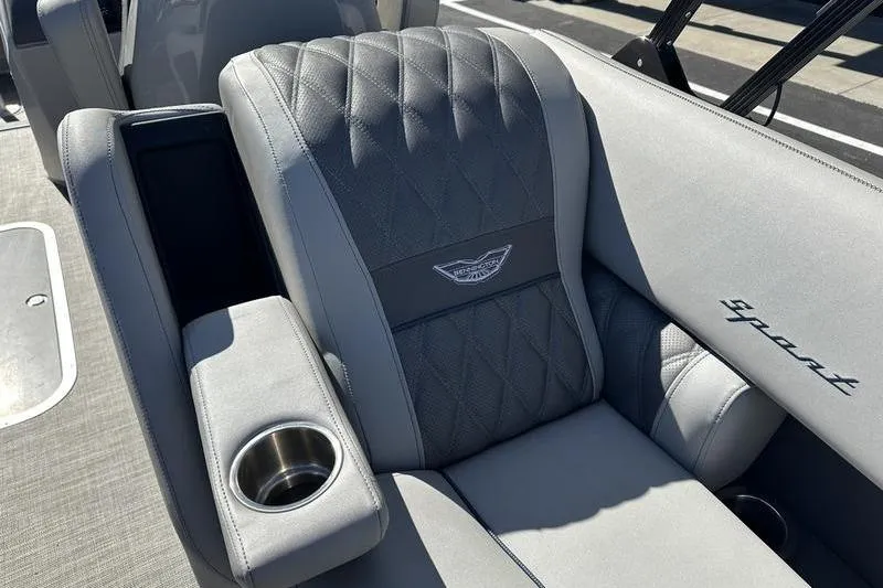 Slide: The Image of Luxurious seating on 2021 Bennington 24 RTFB boat with cup holder and embroidered logo. - 27