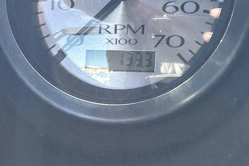 Slide: The Image of Close-up of a 2021 Bennington 24 RTFB RPM gauge displaying 1313 RPM. - 28