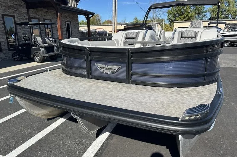 Slide: The Image of 2021 Bennington 24 RTFB pontoon boat with sleek design and spacious seating. - 6