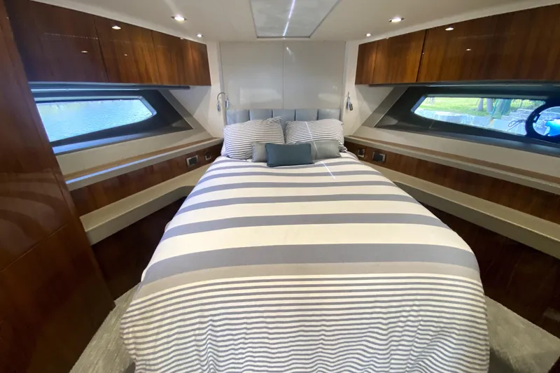 Slide: The Image of Luxurious bedroom interior of 2017 Sunseeker Manhattan 52 yacht with striped bedding. - 24