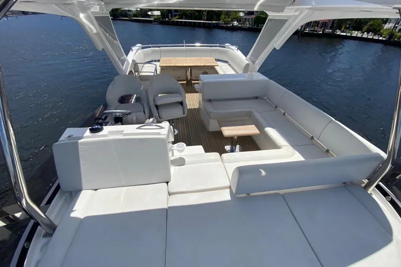 Slide: The Image of Luxurious 2017 Sunseeker Manhattan 52 yacht with spacious deck and elegant seating. - 7
