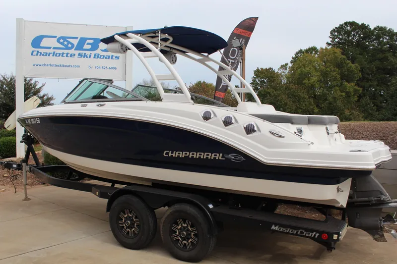 Slide: The Image of 2015 Chaparral 226 SSi boat on trailer at Charlotte Ski Boats dealership. - 2