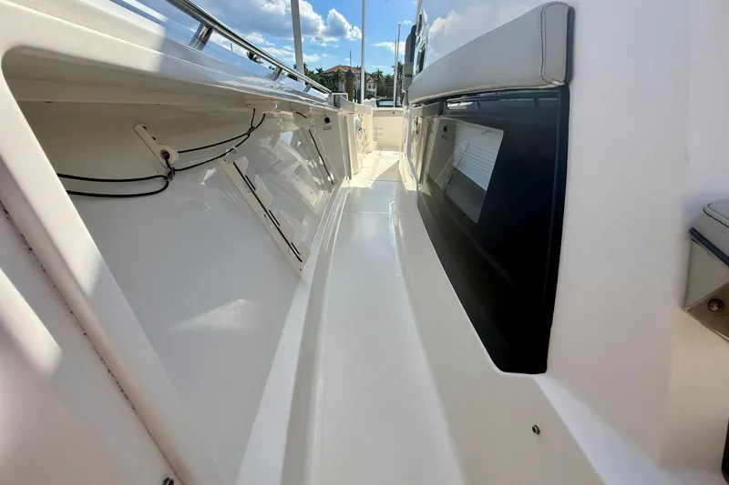 Slide: The Image of 2023 Pursuit S 358 Sport boat deck with sleek design and modern features. - 47