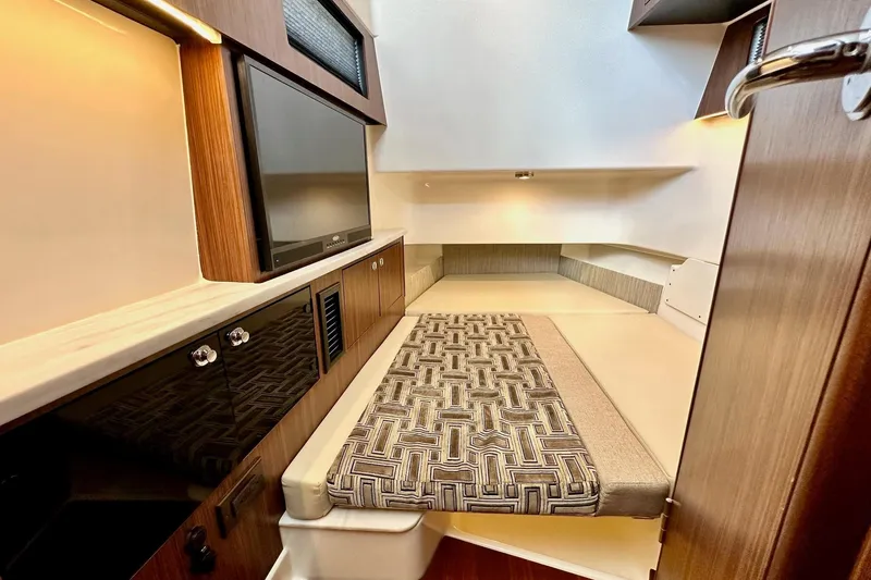 Slide: The Image of 2023 Pursuit S 358 Sport cabin interior with modern design and comfortable seating. - 60
