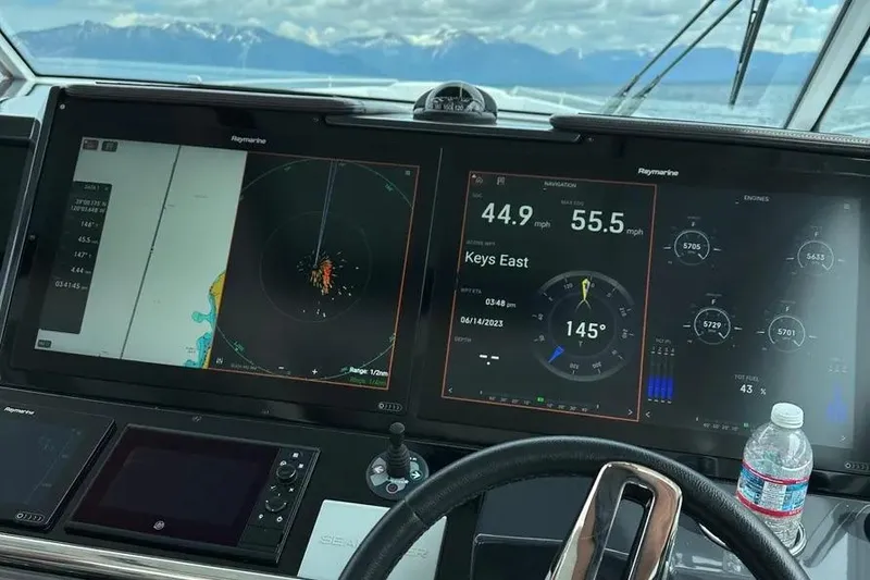 Slide: The Image of Dashboard of a 2019 Formula 430 Super Sport Crossover with navigation and engine displays. - 3