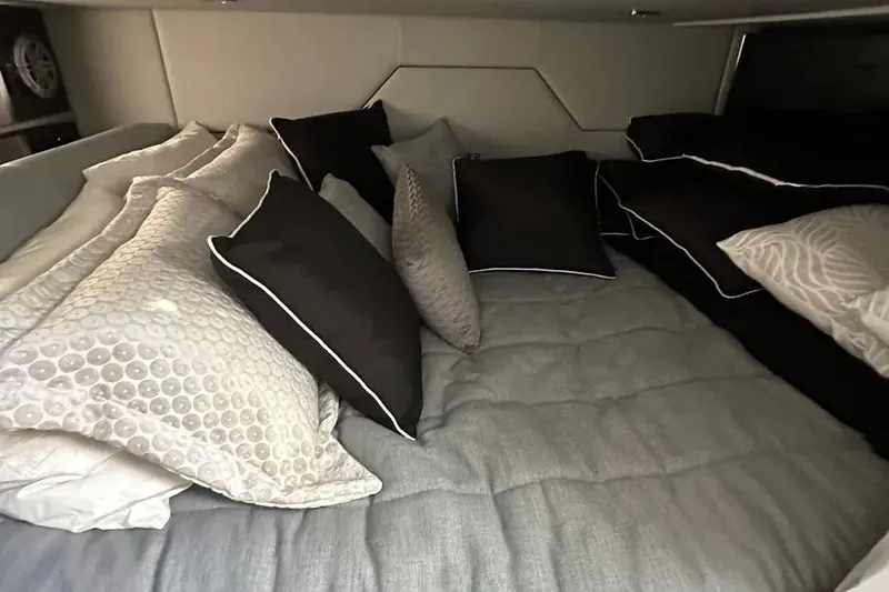 Slide: The Image of Cozy cabin bed with pillows in 2019 Formula 430 Super Sport Crossover. - 5