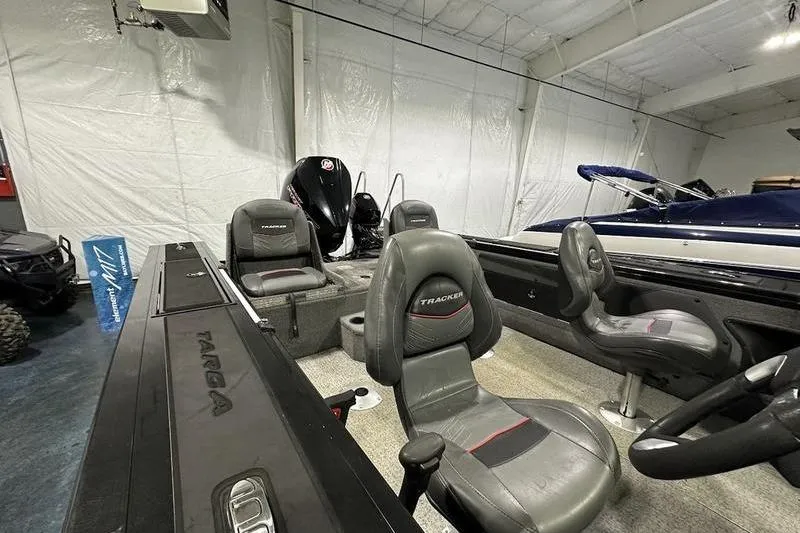Slide: The Image of 2022 Tracker Targa V-19 Combo boat in showroom, on trailer. - 8