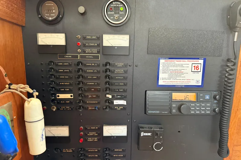 Slide: The Image of Control panel of a 1987 Moody 346 sailboat with gauges and radio equipment. - 21