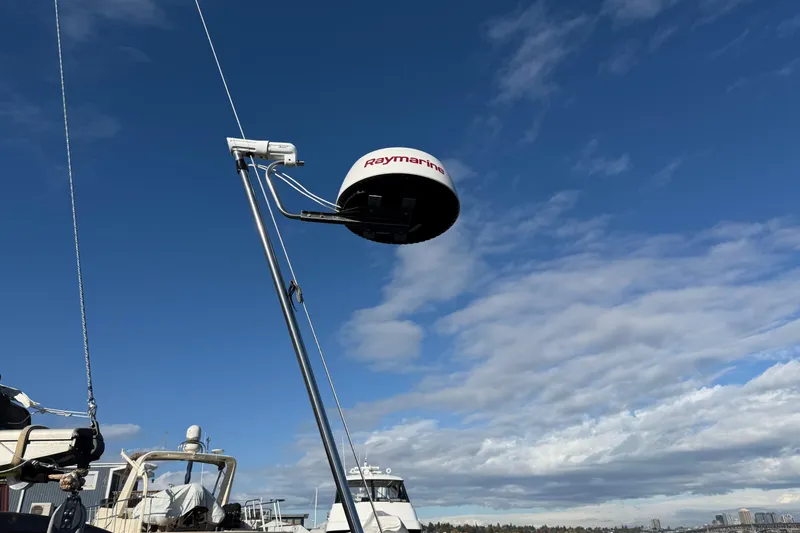 Slide: The Image of Radar equipment on a 1987 Moody 346 sailboat under a clear blue sky. - 27