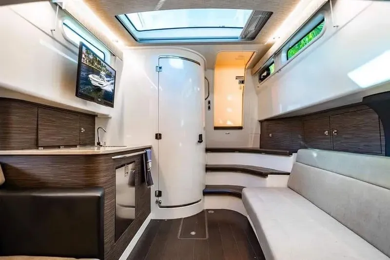 Slide: The Image of Interior of 2022 Boston Whaler 420 Outrage, featuring modern design and comfortable seating. - 16