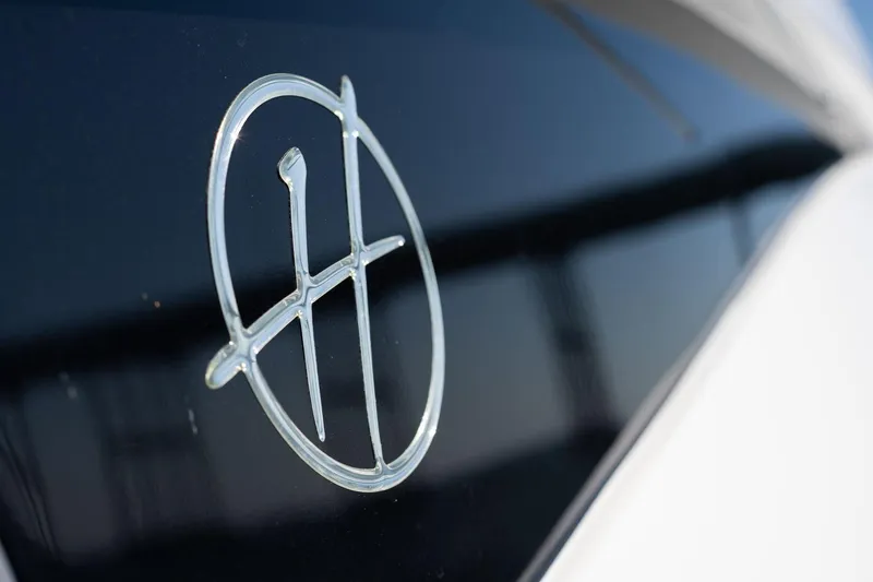 Slide: The Image of 2026 Hanover 375 logo on sleek black surface, close-up view. - 44