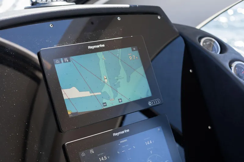 Slide: The Image of Boat navigation system on Hanover 375, 2026 model, displaying nautical map and data. - 48
