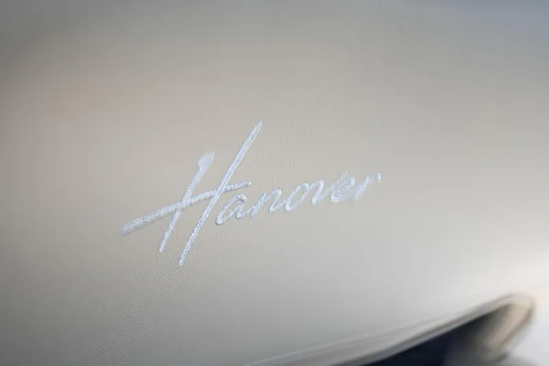 Slide: The Image of Hanover 375 2026 logo on beige leather interior, luxury car branding. - 51