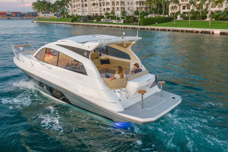 Slide: The Image of Luxurious 2026 Hanover 375 yacht cruising in a scenic waterfront setting. - 8