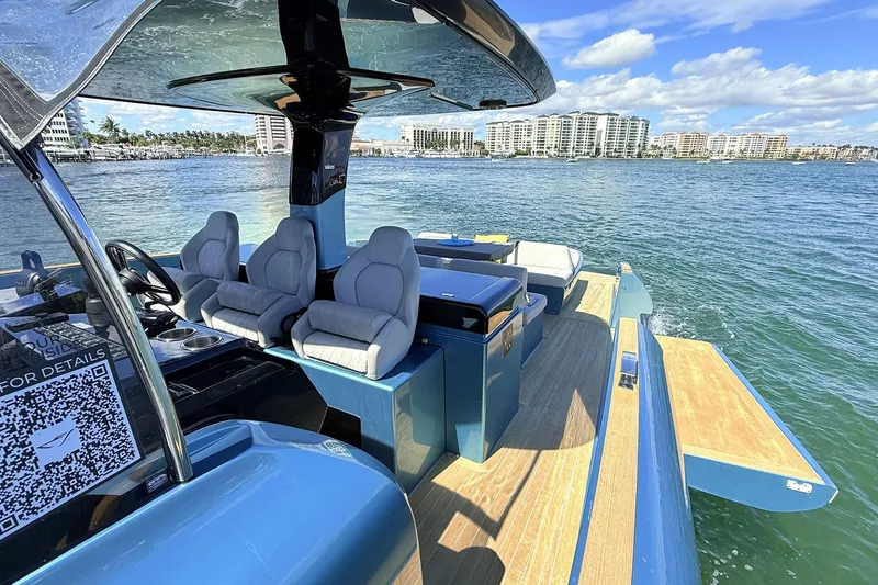 Slide: The Image of Luxurious 2022 Solaris Power 44 yacht interior with plush seating on open water. - 15