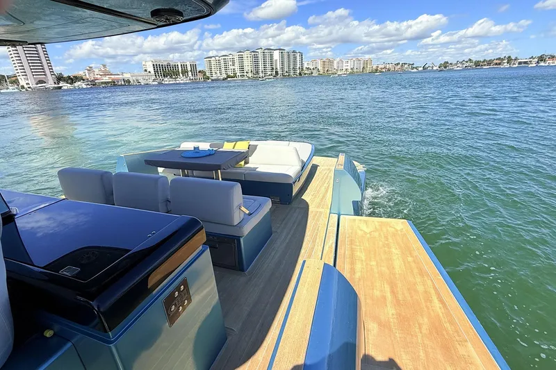 Slide: The Image of Luxurious 2022 Solaris Power 44 yacht with elegant seating, cruising on a sunny day. - 16