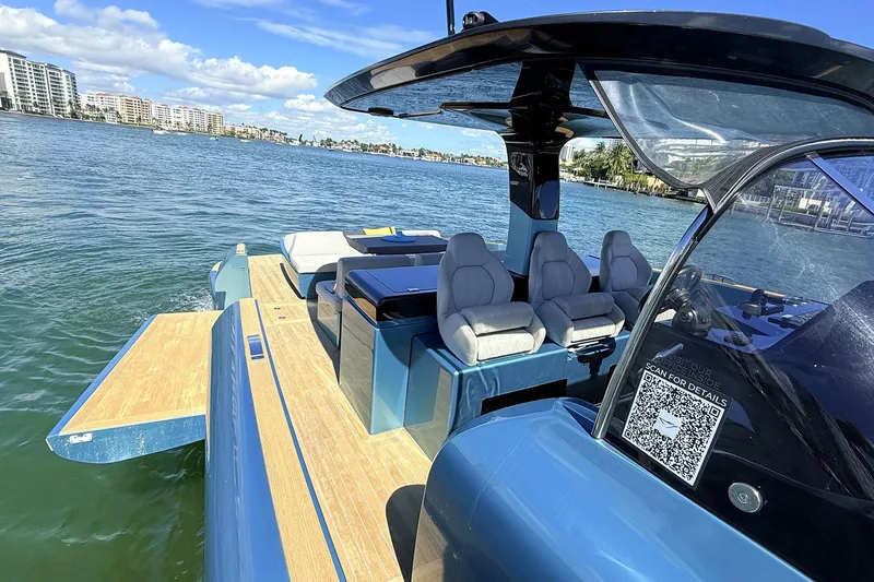 Slide: The Image of 2022 Solaris Power 44 yacht with sleek design, spacious deck, and luxurious seating on the water. - 21