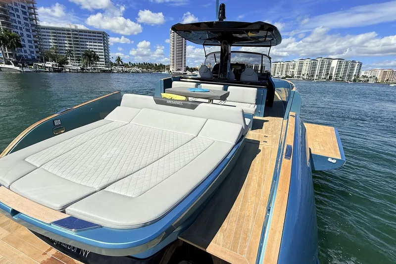 Slide: The Image of Luxurious 2022 Solaris Power 44 yacht with spacious sun deck, docked in scenic marina. - 26