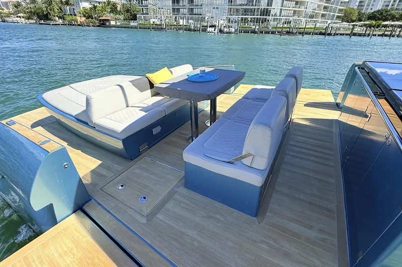 Slide: The Image of Luxurious 2022 Solaris Power 44 yacht with elegant seating and scenic waterfront view. - 27