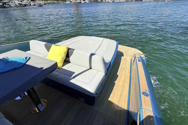 Slide: The Image of Luxurious 2022 Solaris Power 44 yacht deck with seating and scenic water view. - 28