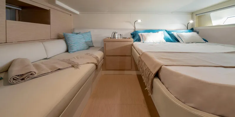 Slide: The Image of Luxurious interior of 2022 Solaris Power 44 yacht with cozy bed and seating area. - 39