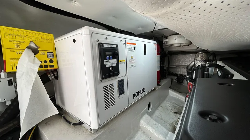 Slide: The Image of Engine room of 2022 Solaris Power 44 featuring a Kohler generator. - 45