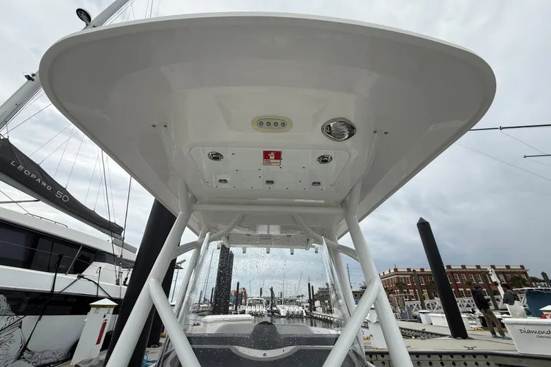 Slide: The Image of 2023 Sea Fox 248 Commander boat at marina, viewed from below the T-top. - 28