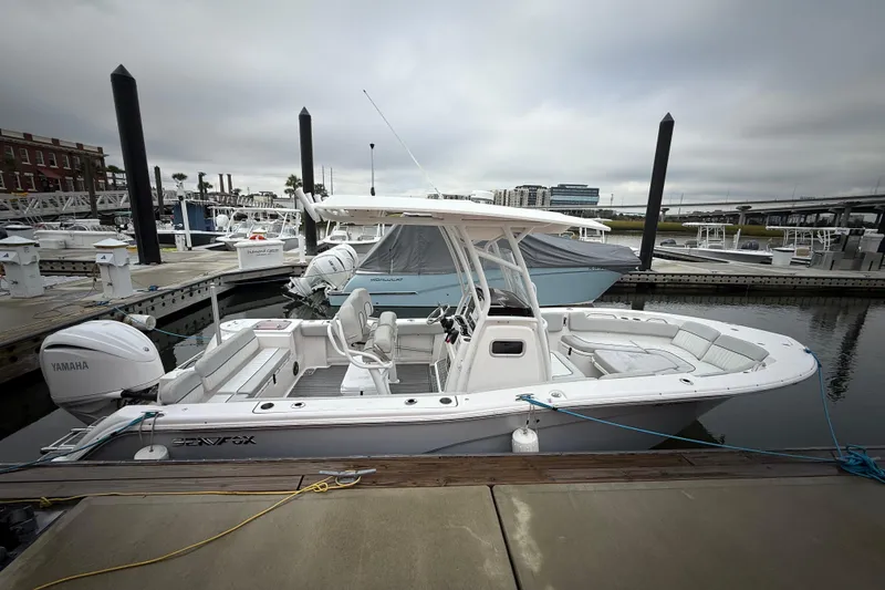 Slide: The Image of 2023 Sea Fox 248 Commander boat docked at marina with Yamaha engine. - 3