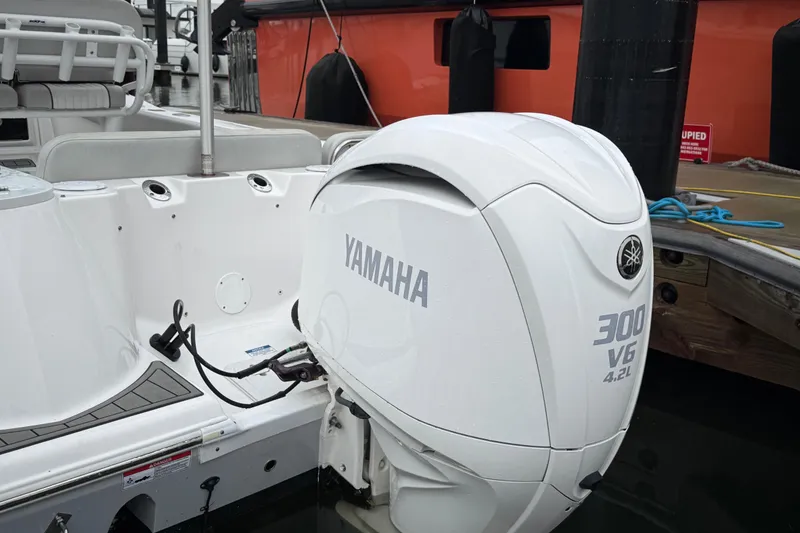 Slide: The Image of 2023 Sea Fox 248 Commander with Yamaha 300 V6 outboard engine at dock. - 4