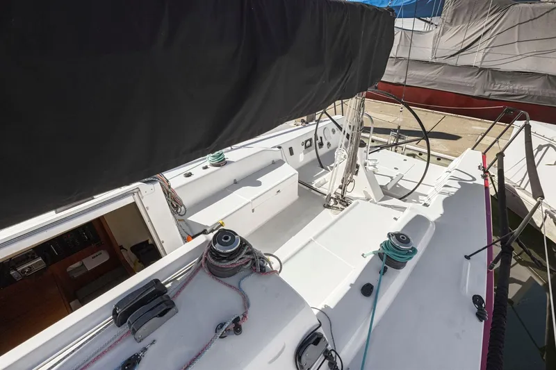 Slide: The Image of 2011 J Boats J 111 sailboat cockpit with winches and steering wheel. - 13