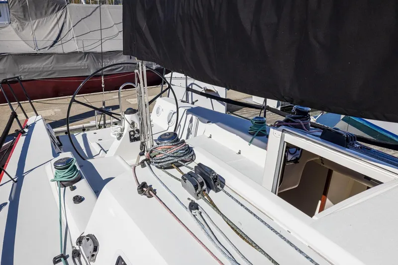 Slide: The Image of 2011 J Boats J 111 sailboat cockpit with ropes and steering wheel. - 18