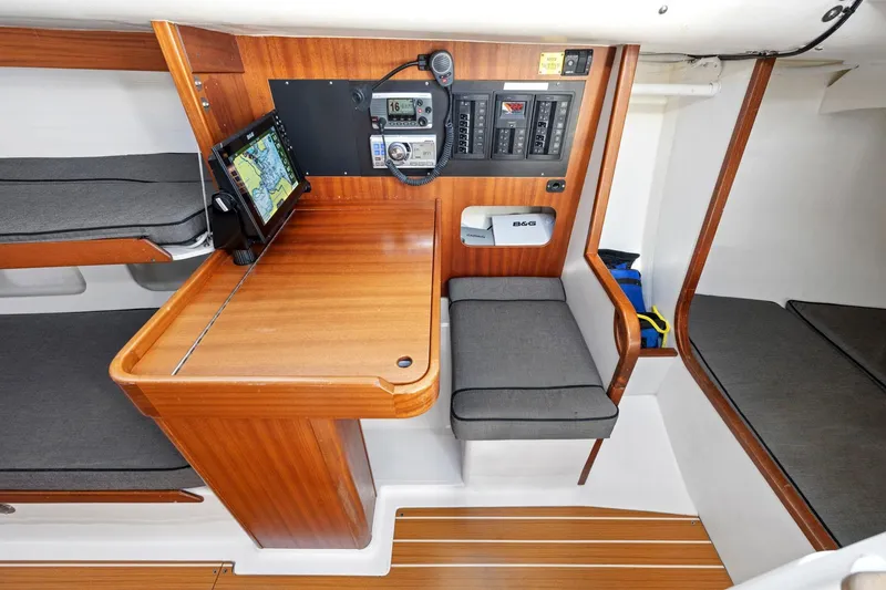 Slide: The Image of Interior of a 2011 J Boats J 111 sailboat with navigation station and seating. - 27