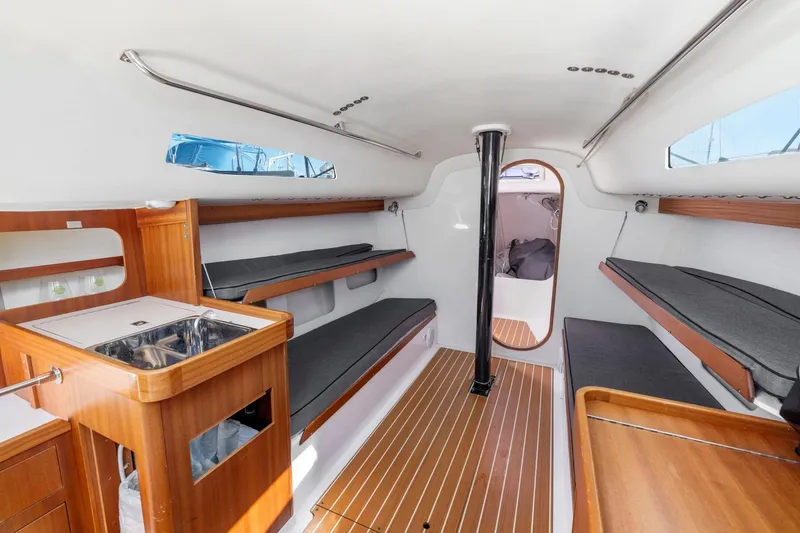 Slide: The Image of Interior of 2011 J Boats J 111 sailboat with wooden finishes and seating. - 30