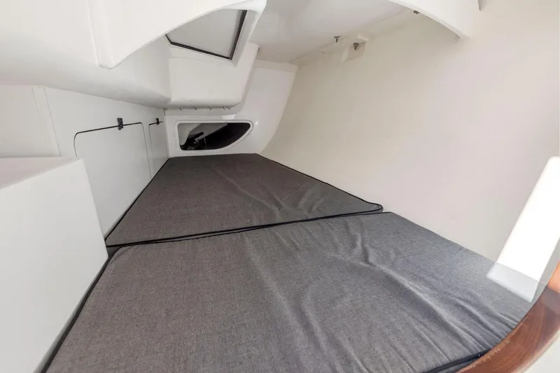 Slide: The Image of Interior cabin of 2011 J Boats J 111 sailboat with gray cushions. - 32