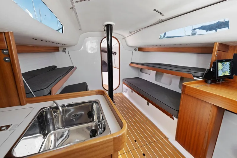 Slide: The Image of Interior of 2011 J Boats J 111 sailboat with wooden finishes and modern amenities. - 33