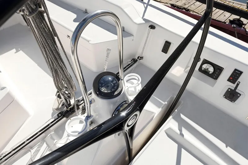 Slide: The Image of Cockpit of 2011 J Boats J 111 sailboat with steering wheel and navigation instruments. - 9
