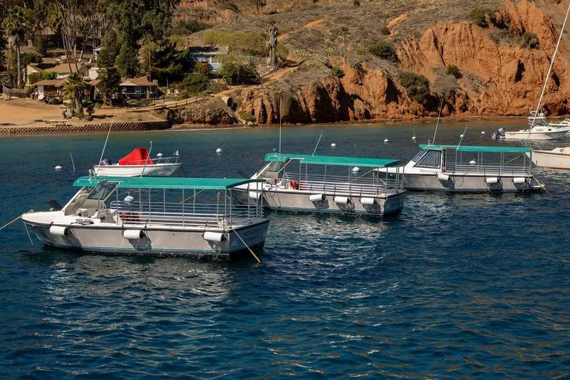 Slide: The Image of Boats docked in a scenic bay, Seahawk Island Hopper 2018 models. - 14