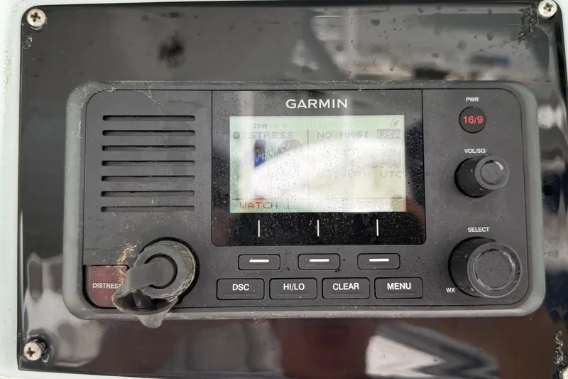 Slide: The Image of Garmin marine radio on 2022 Sea Fox 288 Commander boat dashboard. - 10