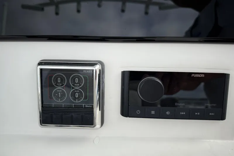 Slide: The Image of Control panel and audio system on 2022 Sea Fox 288 Commander boat. - 12
