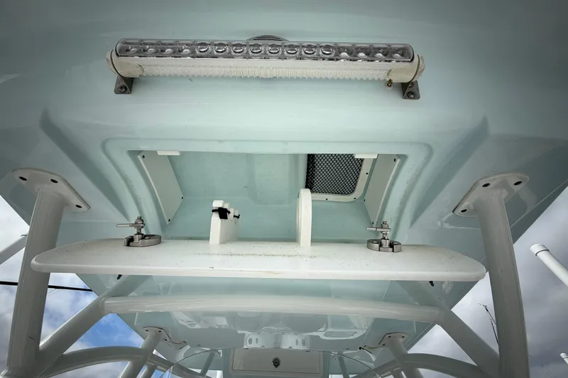 Slide: The Image of 2022 Sea Fox 288 Commander boat interior view with storage compartment and LED light. - 21
