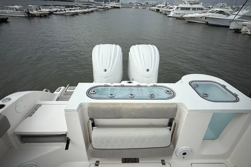 Slide: The Image of 2022 Sea Fox 288 Commander boat with dual engines docked at marina. - 24