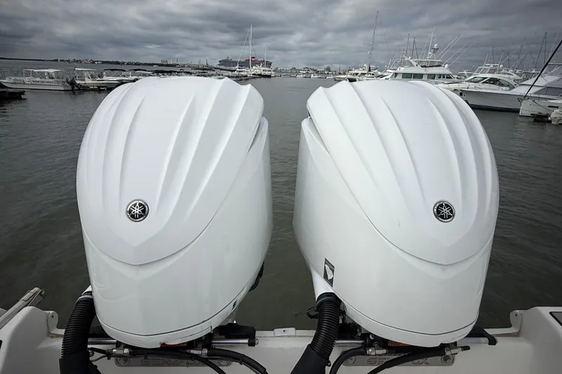 Slide: The Image of Twin Yamaha outboard engines on a 2022 Sea Fox 288 Commander boat in a marina. - 34