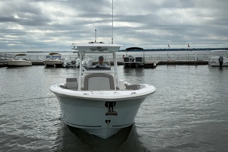 Slide: The Image of 2022 Sea Fox 288 Commander boat docked on a cloudy day. - 4