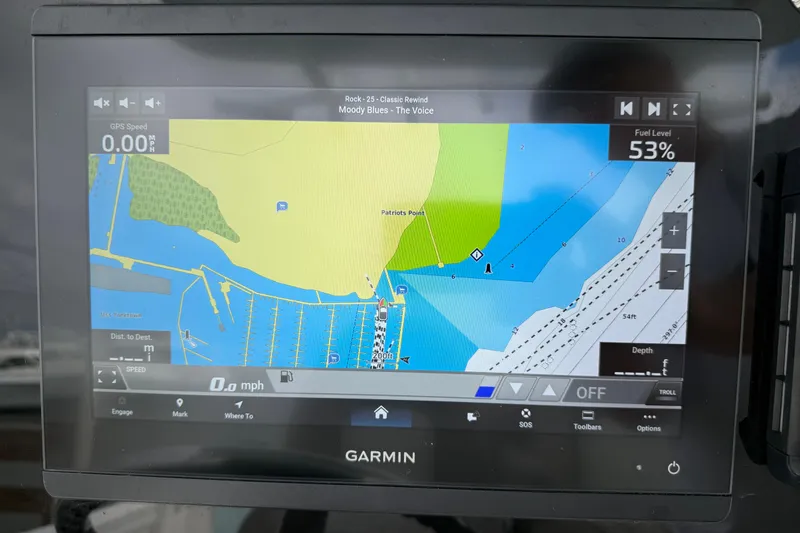 Slide: The Image of Garmin navigation display on 2022 Sea Fox 288 Commander, showing map and fuel level. - 7
