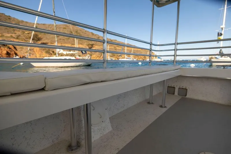 Slide: The Image of 2019 Seahawk Island Hopper boat interior with ocean view and railing. - 3