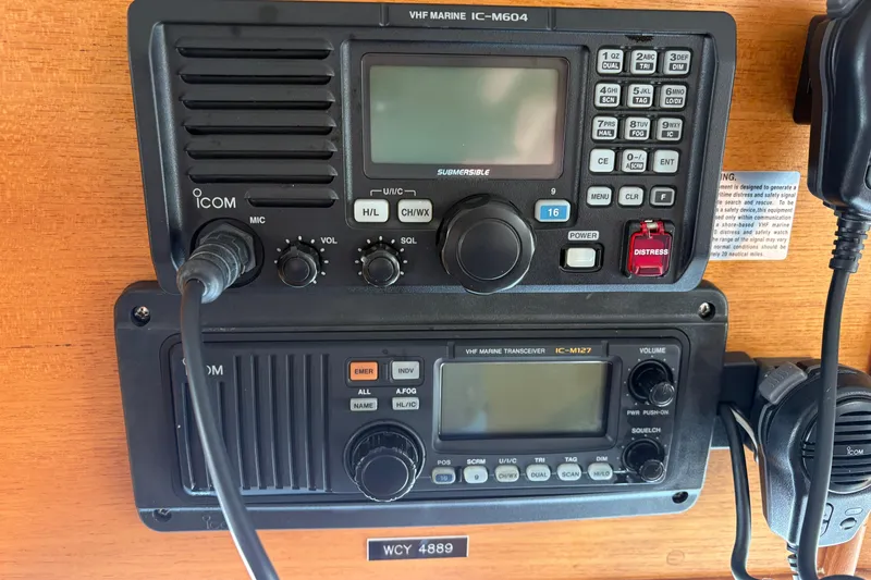 Slide: The Image of VHF marine radios on 1998 Grand Banks 52 Europa yacht dashboard. - 35